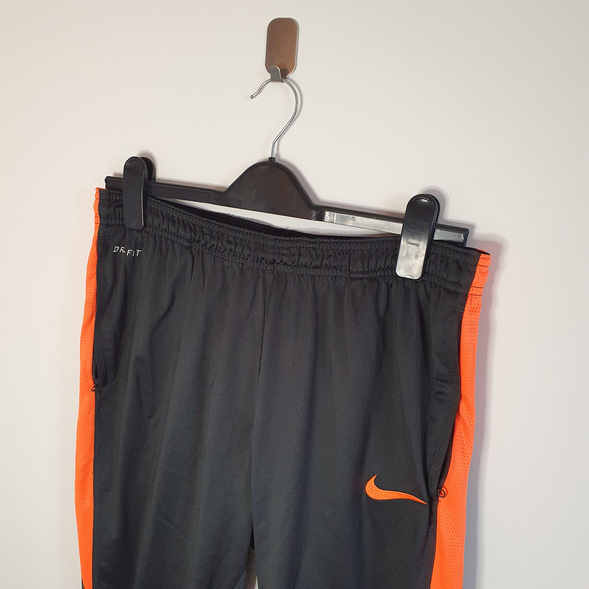 NIKE Black and Orange Tracksuit Bottoms Three Chillies Vintage